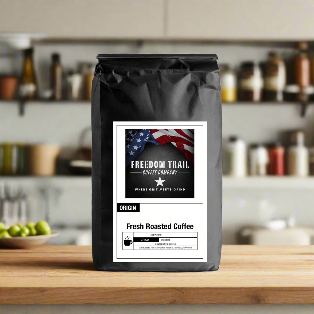 Black coffee bag with 'Freedom Trail Coffee Company' label on a white background